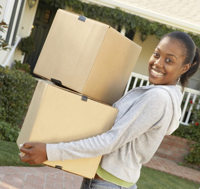 woman with moving boxes